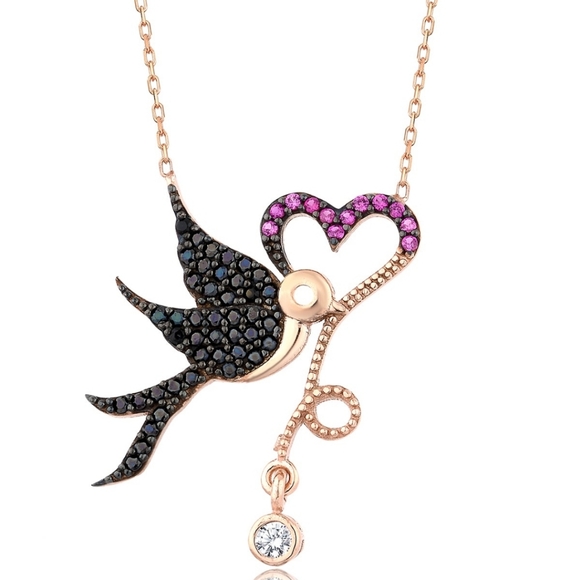 Jewelry - 🆕925 STERLING SILVER HEART CARRYING BIRD NECKLACE